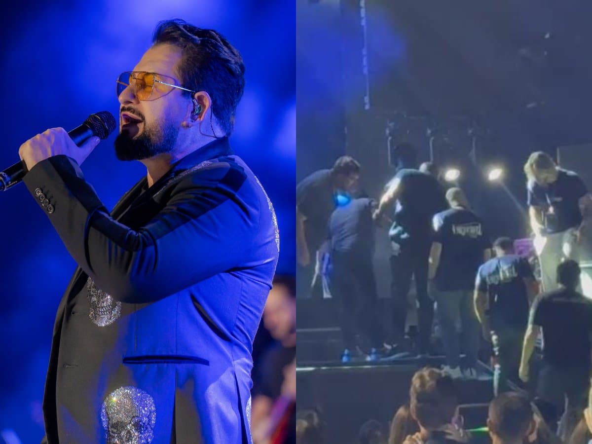 os-fas-apreensivos-depois-que-marrone-cai-do-palco-e-cabe-a-cabeca-durante-um-show